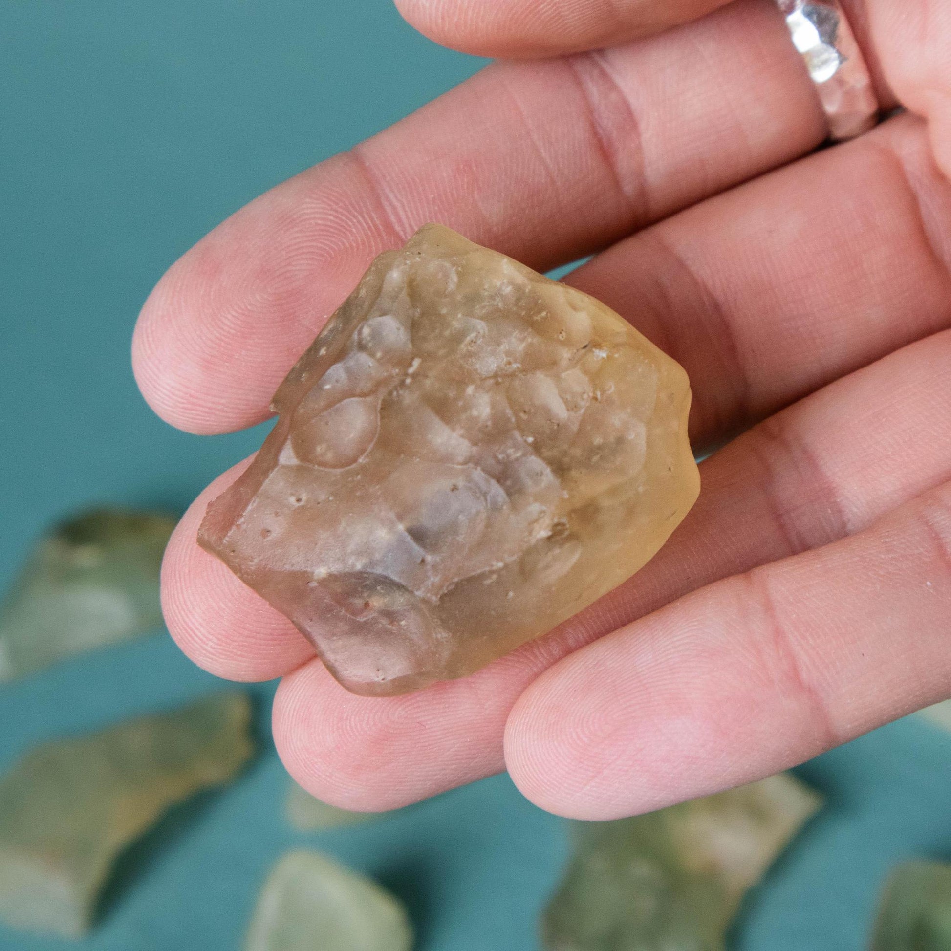 libyan desert glass, libyan desert glass specimen, crystal specimen, libyan desert glass crystal, libyan desert glass stone, libyan desert glass properties, libyan desert glass healing properties, libyan desert glass metaphysical properties, libyan desert glass meaning