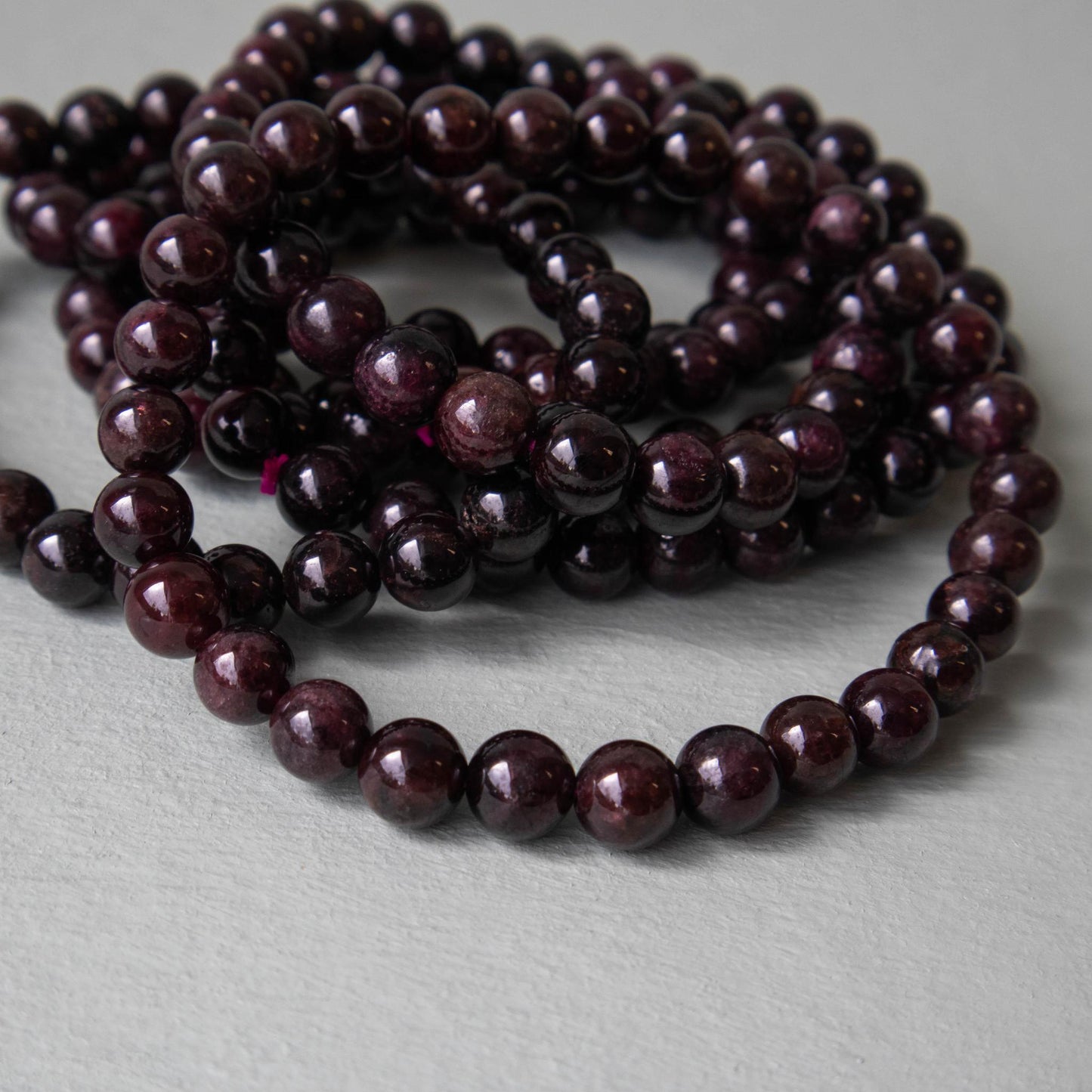 garnet, garnet bracelet, garnet jewelry, crystal bracelet, crystal jewelry, gemstone bracelet, gemstone jewelry, garnet crystal, garnet stone, garnet gemstone, garnet properties, garnet healing properties, garnet metaphysical properties, garnet meaning