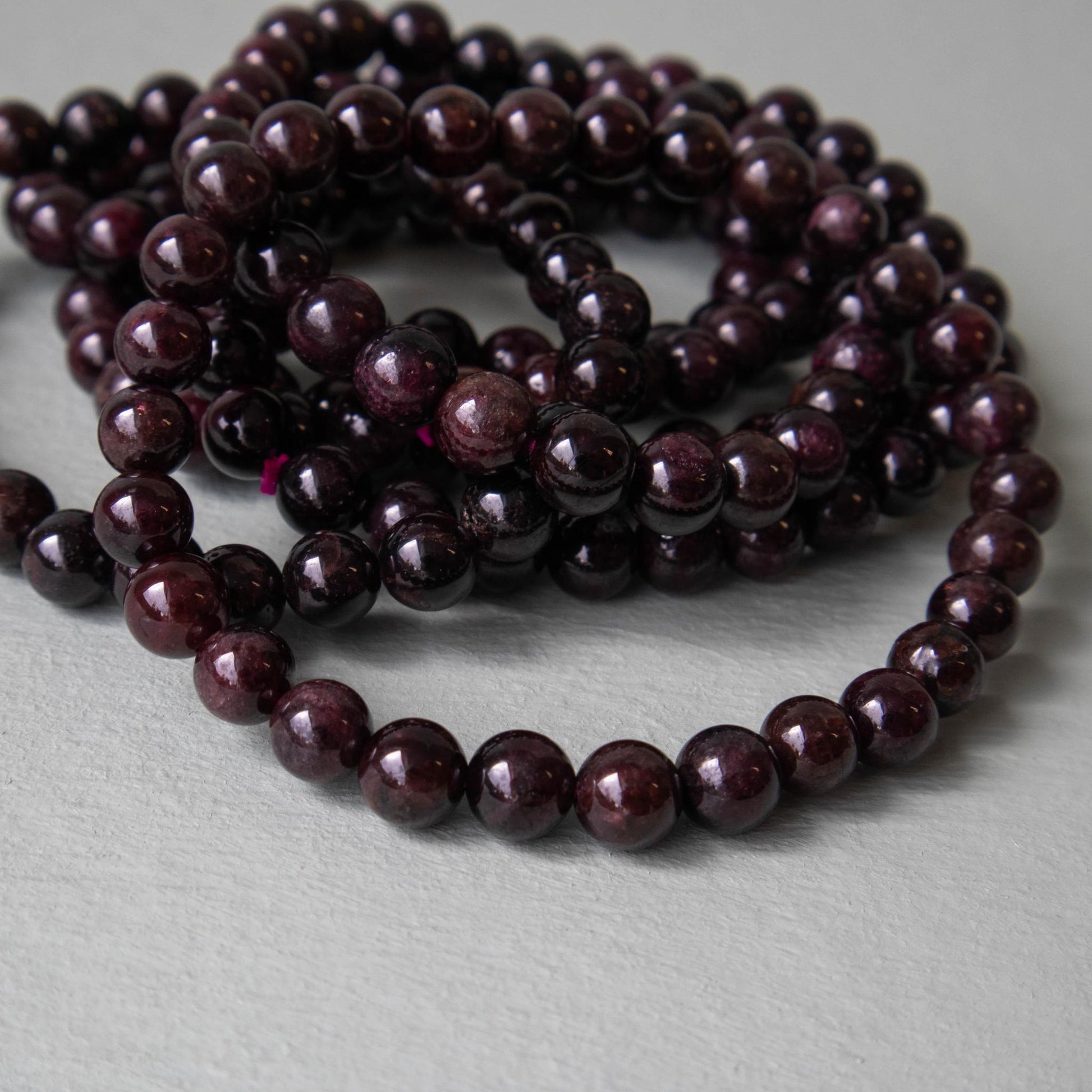 garnet, garnet bracelet, garnet jewelry, crystal bracelet, crystal jewelry, gemstone bracelet, gemstone jewelry, garnet crystal, garnet stone, garnet gemstone, garnet properties, garnet healing properties, garnet metaphysical properties, garnet meaning