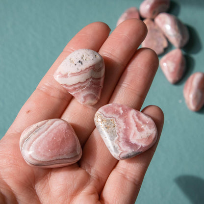 rhodochrosite, rhodochrosite tumble, rhodochrosite tumbled stone, crystal tumble, small crystal tumble, small tumbled stone, rhodochrosite crystal, rhodochrosite stone, rhodochrosite properties, rhodochrosite healing properties, rhodochrosite metaphysical properties, rhodochrosite meaning