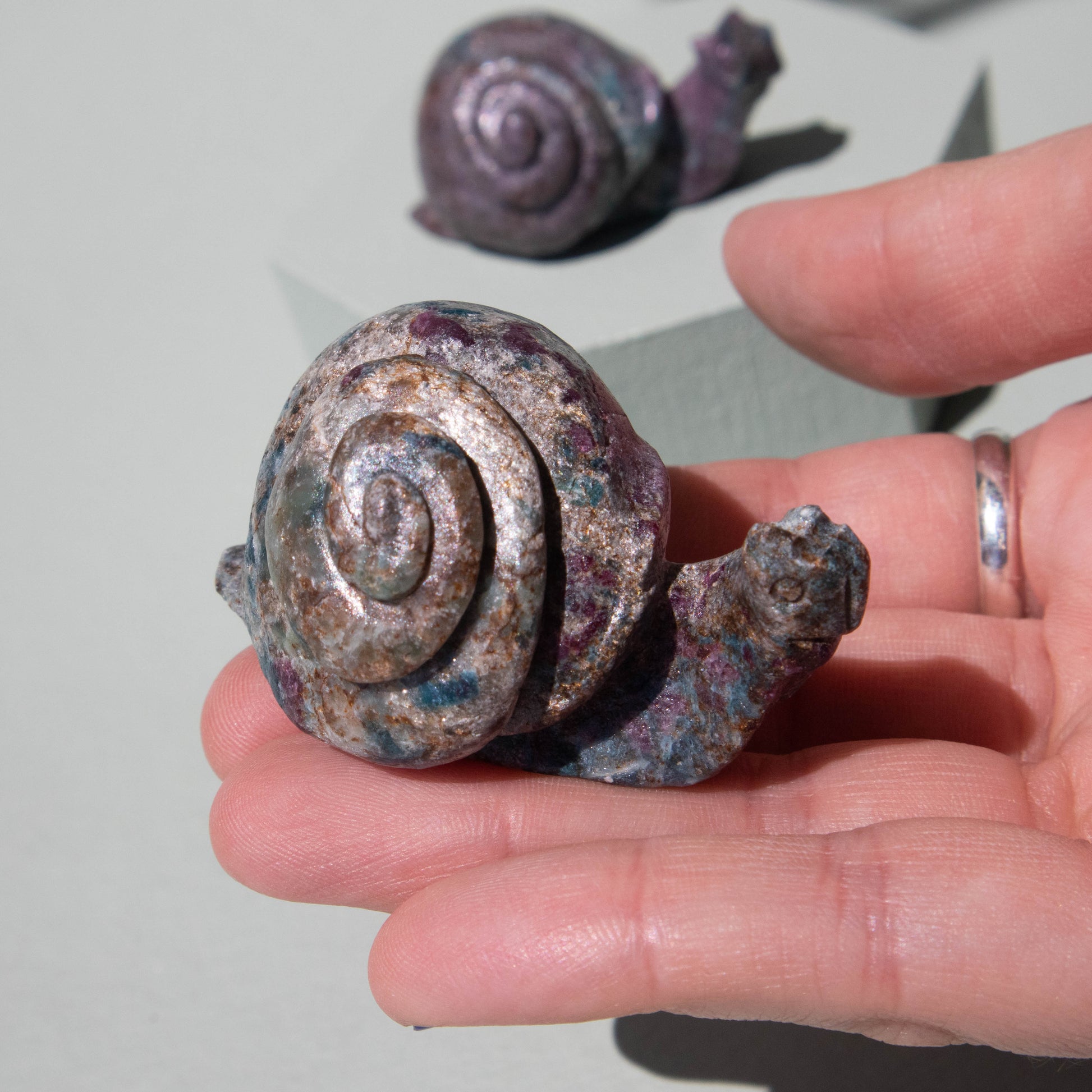 ruby kyanite, ruby kyanite snail, ruby kyanite animal, crystal snail, gemstone snail, ruby kyanite crystal, ruby kyanite stone, ruby kyanite properties, ruby kyanite healing properties, ruby kyanite metaphysical properties, ruby kyanite meaning