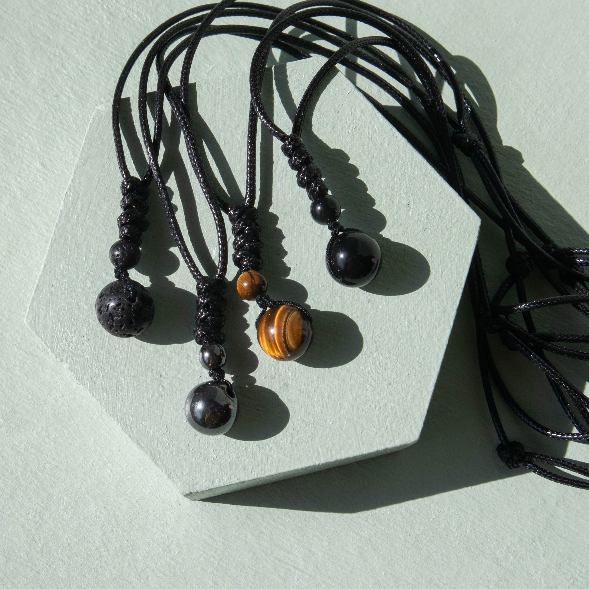 lava, lava rock, hematite, tiger eye, tigers eye, obsidian, bead necklace, cord necklace, crystal necklace, gemstone necklace, gemstone jewelry, crystal jewelry