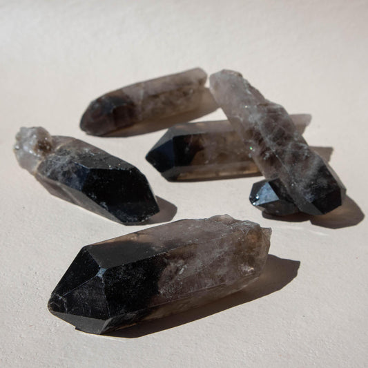 smoky quartz, smoky quartz point, natural smoky quartz, smoky quartz specimen, crystal point, crystal specimen, natural specimen, smoky quartz crystal, smoky quartz stone, smoky quartz properties, smoky quartz healing properties, smoky quartz metaphysical properties, smoky quartz meaning